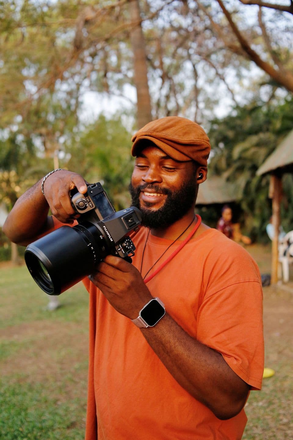 A photographer holding a camera