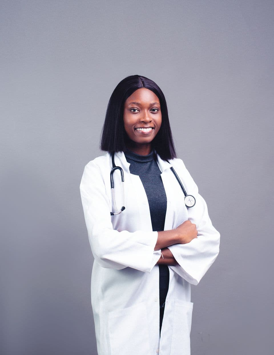 A smiling doctor with a stethoscope